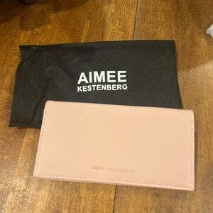 Brand new Amy Kestenberg pink vegan leather wallet